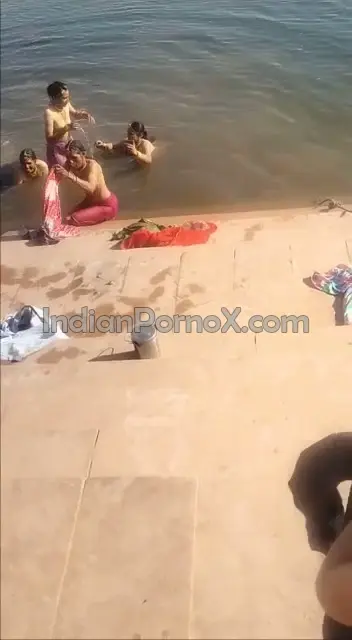 Indian group topless Bhabhi bathing in pond